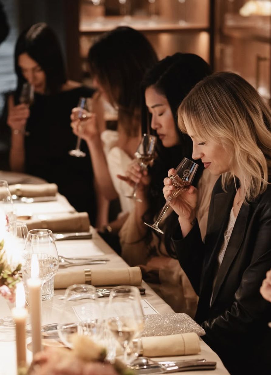 Guests tasting Louis XIII by candlelight